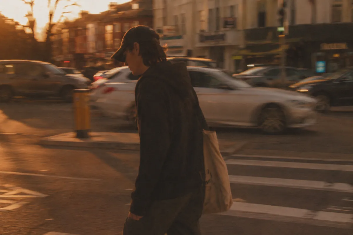 Golden-hour street photograph, motion blur, low dynamic range — Krea 2 Large example, 3:2, raw creativity